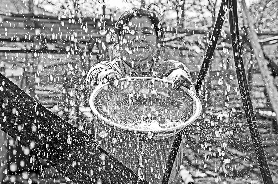 Mapuche indigenous woman, collecting fresh water. Reigolil, Cautin, Chile